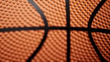 Basketbolun Macro çekimi, karanlık sahadaki CGI animasyonuna doğru çekiliyor.