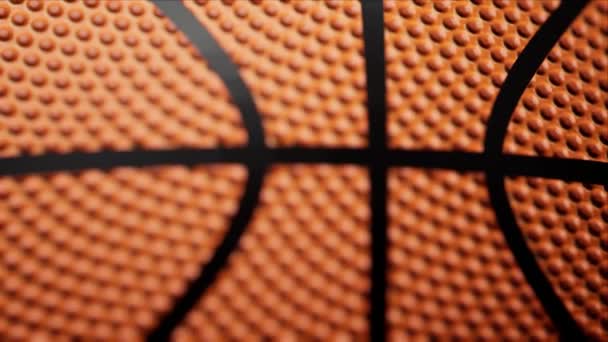Макро-кадры баскетбола тянутся к баскетбольной статике на темном корте CGI анимации — стоковое видео