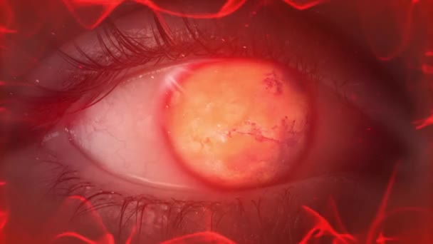 Красный вращающийся шар внутри полого глазного яблока с красным сиянием и графическим фоном движения частиц — стоковое видео