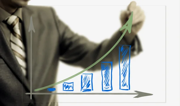 Empresario dibujando gráfico creciente, desarrollo y concepto de crecimiento —  Fotos de Stock