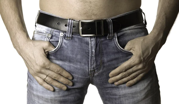 Imagem cortada do homem em jeans closeup no fundo branco — Fotografia de Stock