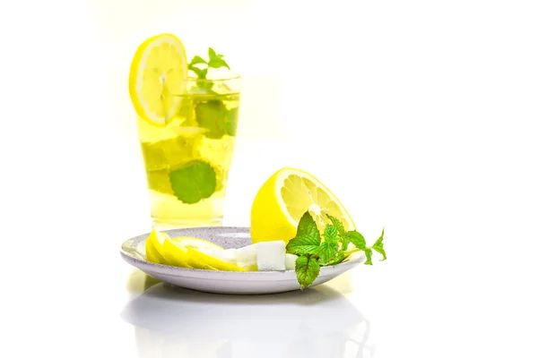 Fresh cocktail and plate of lemon mint sugar isolated on white background — Stock Photo, Image