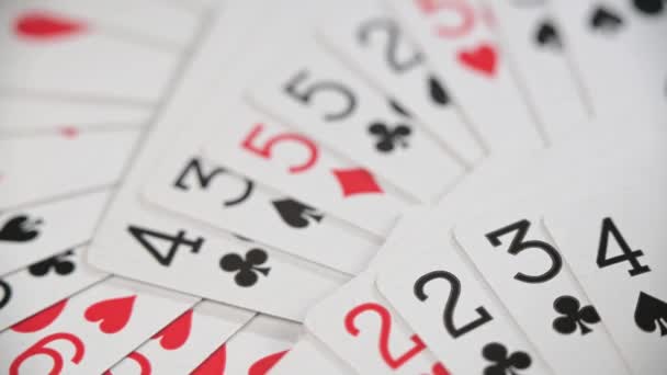 Background playing cards close up are neatly laid out on the table. — Stock Video