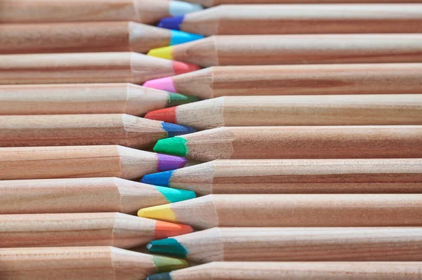 Color pencils in arrange in color wheel colors on white background — Stock Photo, Image