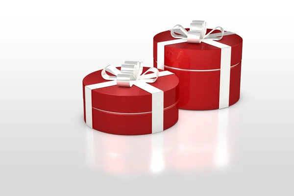 Rode ronde geschenkdoos met wit lint — Stockfoto