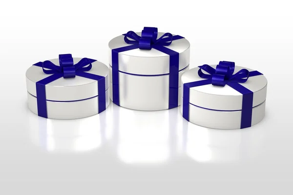 Witte ronde geschenkdoos met blauw lint — Stockfoto