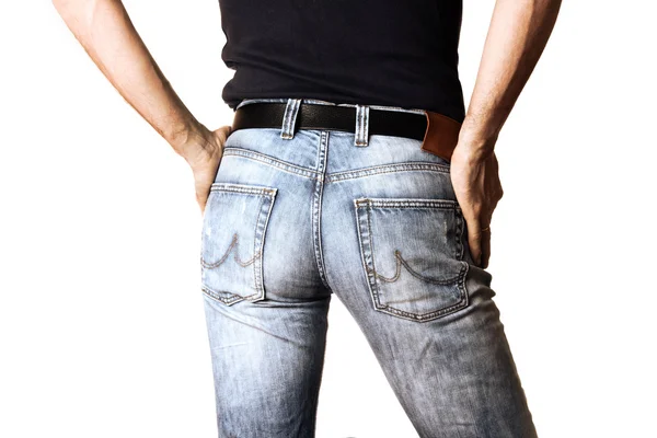 Przycięty obraz człowieka w dżinsy na białym tle — Zdjęcie stockowe