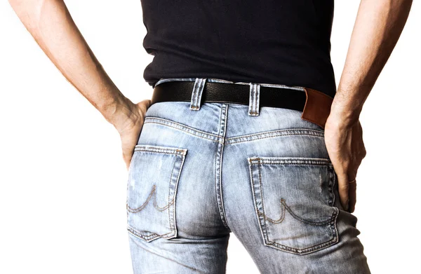 Cropped image of a man in jeans on white background — Stock Photo, Image