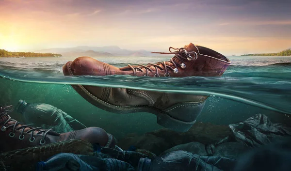 塑料污染与靴子在海面上的水面上的水 环境问题 — 图库照片