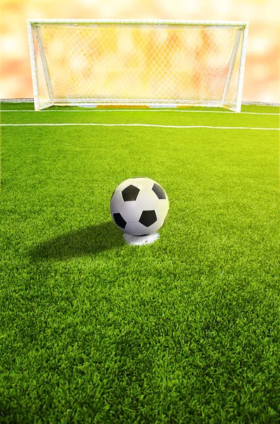 A soccer ball in front of goal — Stock Photo, Image