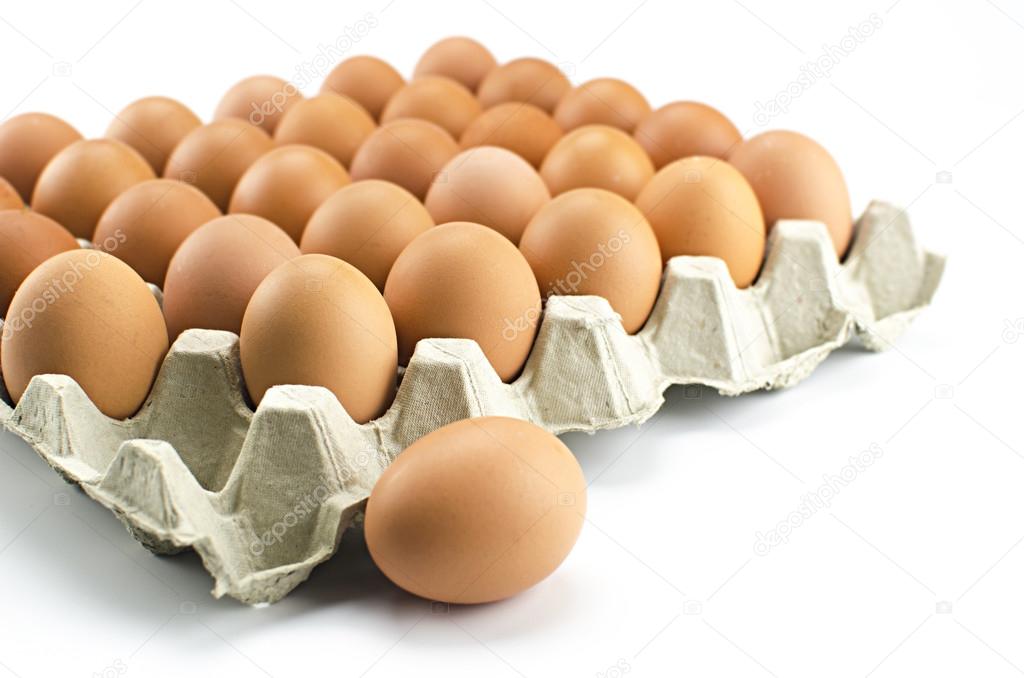 Chicken eggs in egg tray Stock Photo by ©chaiyapruek 77881488