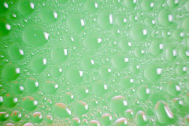 Renkli sıvı damlacıkları arka plan