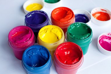 jars with colorful gouaches clipart