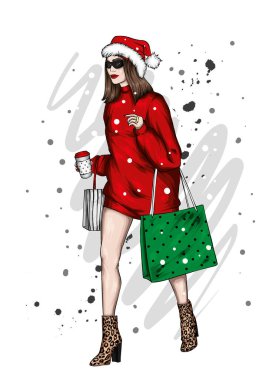 Şık giyinmiş güzel bir kız ve yeni yıl şapkası. Yeni yıl ve Noel, Noel Baba. Moda Biçimi. 