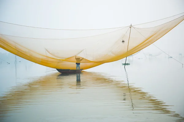 stock image Unidentified fisher man check his nets