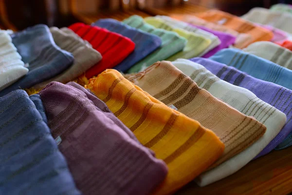 Traditional clothes made from silk are sold in Inle lake, Myanmar — Stock Photo, Image