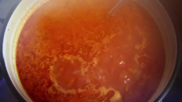 Stove top with pan of russian borsch — Stock Footage Stove top with pan of russian borsch Stock Footage