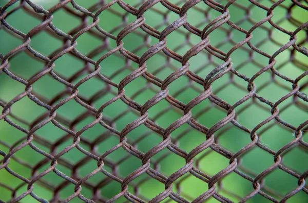 Texture of rusty metal mesh — Stock Photo, Image