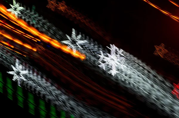 カラフルなクリスマスぼかし星ライト — ストック写真
