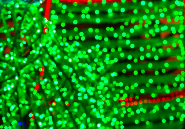 Coloridas luces de Navidad borroso fondo . — Foto de Stock