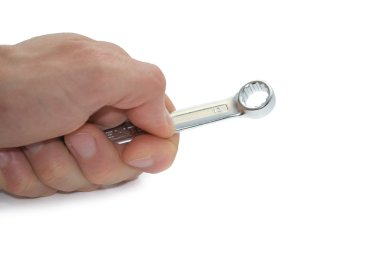 Elinde beyaz izole Spanner aracı