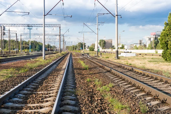 Railway Tracks going through industrial area — Stock Photo, Image