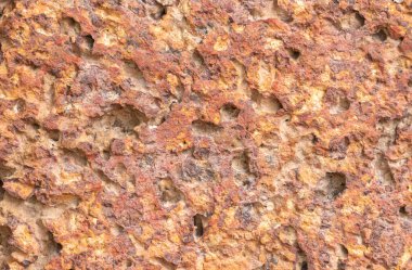 Kırmızı yanaklı tuğla duvarın bulanıklığı gözenekli ve ince taneli arka plan deseni, kusursuz kara zemin partern