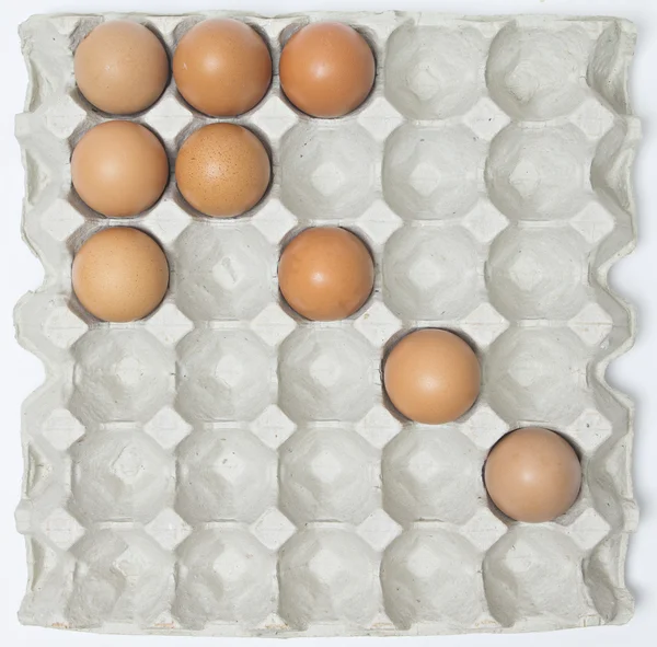 Huevo en bandeja de papel con patrón . —  Fotos de Stock