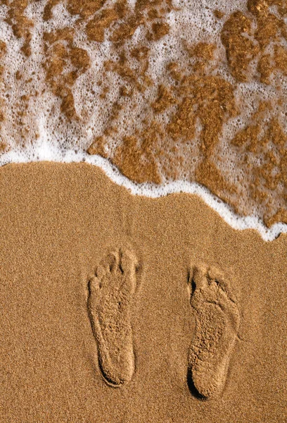 Pegadas na areia. praia — Fotografia de Stock