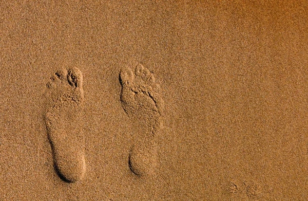 Pegadas na areia. praia — Fotografia de Stock