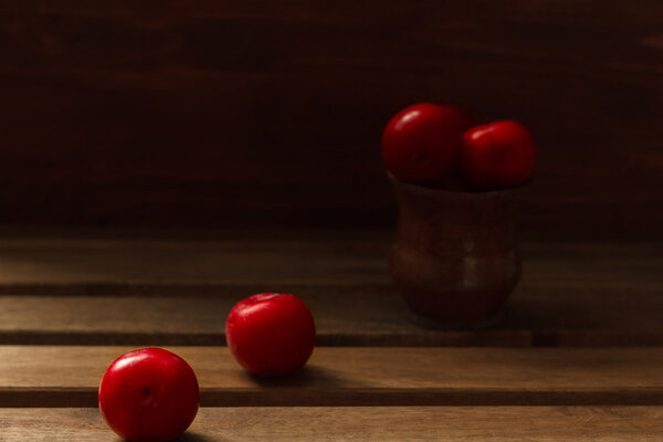 Fresh plums on a country table