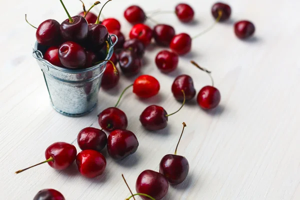 A bucket of cherries Stock Photo