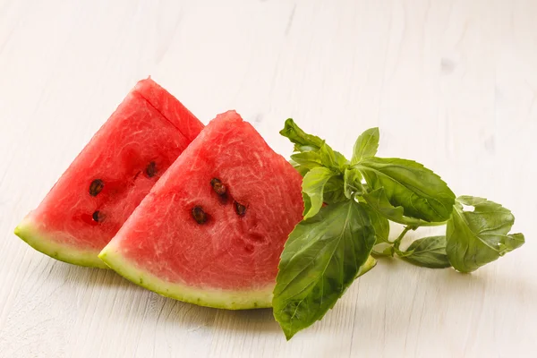 watermelon on a white wooden background