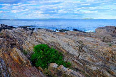 The rocky cast of Maine with Islands on the horizon