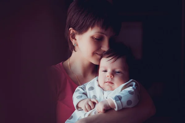 Tender photo of beautiful young mother with her little adorable baby — Stock Photo, Image