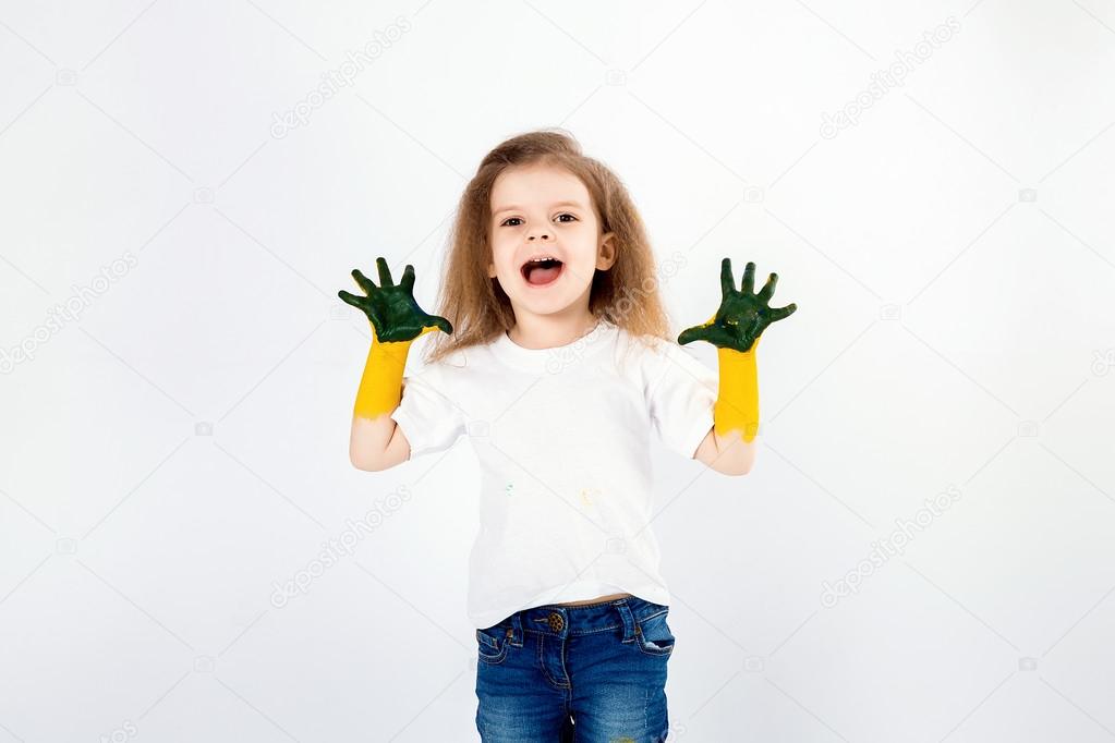 Adorable little girl, modern hair style, white shirt, blue jeans poses, scream, roar, smile. She has paint smeared on her hands. Isolated. White. Stock Photo by ©zamuruev 105254252 Adorable little girl, modern hair style, white shirt, blue jeans poses, scream, roar, smile. She has paint smeared on her hands. Isolated. White. Stock Photo by ©zamuruev 105254252