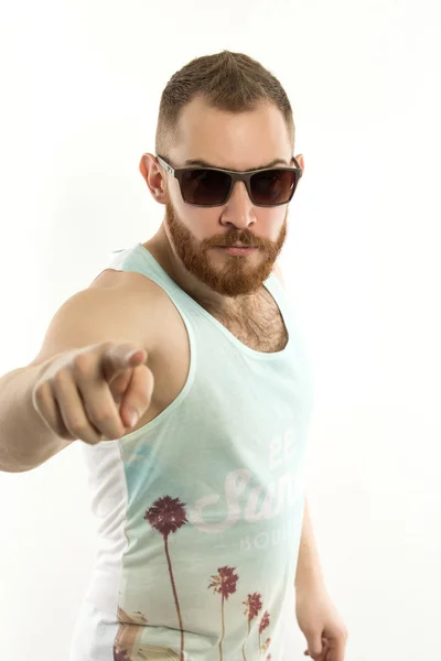 Portrait of young bearded man in sunglasses looking up — Stock Photo, Image