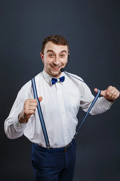 Cheeful presenter man pulling suspenders — Φωτογραφία Αρχείου