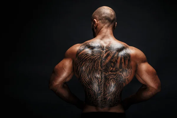 Vista de hombres tatuados de nuevo — Foto de Stock