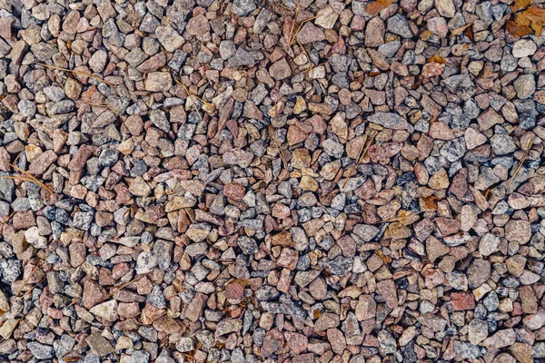 Fundo de granito cinza natural brita pedra, macadame. Macro foto de textura de pedra quebrada ou entulho com lugar para texto. Pedra esmagada. Materiais de construção. Texturas — Fotografia de Stock