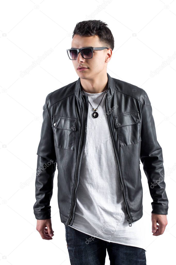 Fashion portrait of young handsome man. Cool rap dj, electro house music, deep house, mens fashion style,black style, leather jacket, rap, cat, b-boy, freestyler, singer, talented rap singer