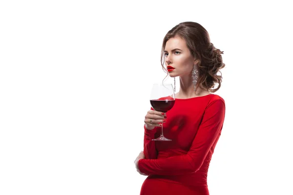 Beautiful woman holding glass of wine onwhite background — Stock Photo, Image