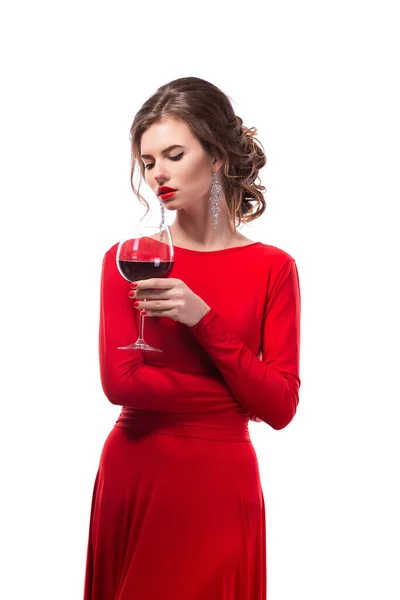 Beautiful woman holding glass of wine onwhite background — Stock Photo, Image