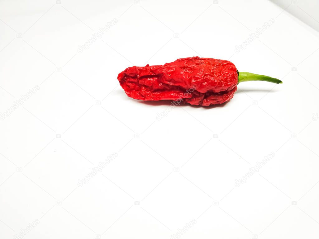 bhut jolokia ghost pepper isolated on white background. fresh Carolina Reaper.