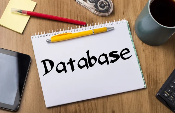 Database - Blocco note con testo — Foto Stock