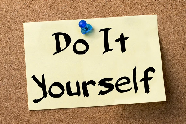 Do It Yourself - adhesive label pinned on bulletin board — Stock Photo, Image