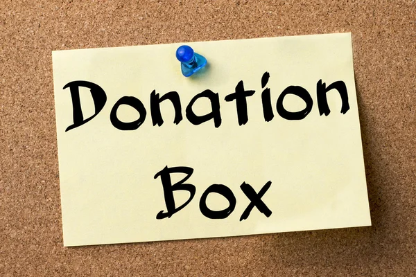 Caja de Donación - etiqueta adhesiva fijada en el tablón de anuncios — Foto de Stock
