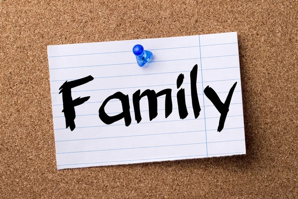 Family - teared note paper pinned on bulletin board — Stock Photo, Image