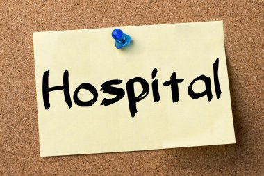 Hastane - yapışkanlı etiket bulletin board tutturulmuş.
