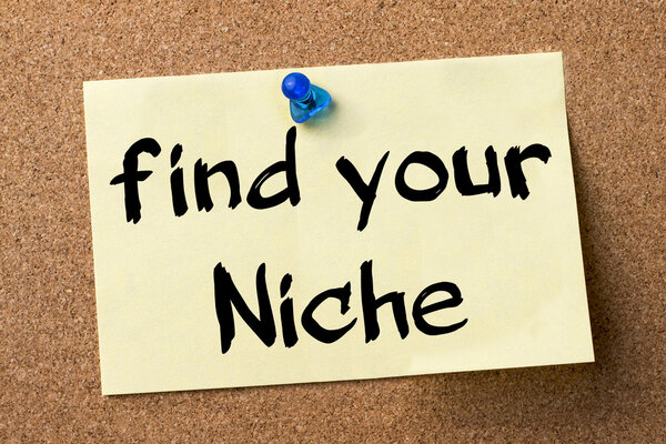 Find your Niche - adhesive label pinned on bulletin board